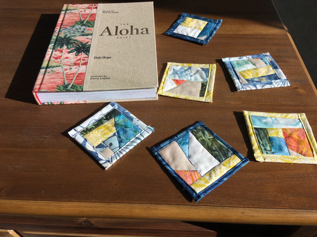 Batik quilted patchwork coasters on a coffee table